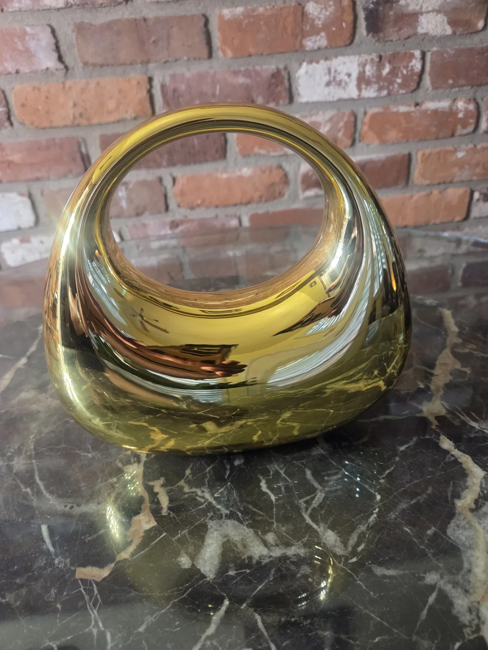 Metallic Gold Circular Handle Clutch